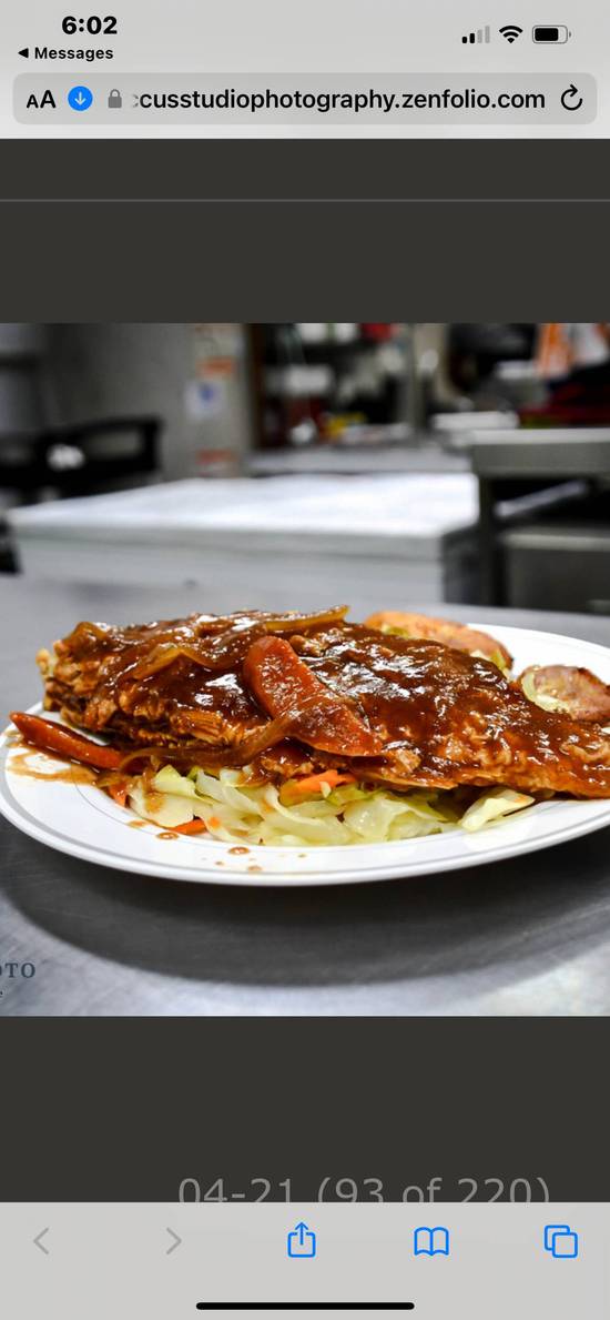 WHOLE  RED SNAPPER NOT SPICY Served with jasmine rice cabbage and plantains