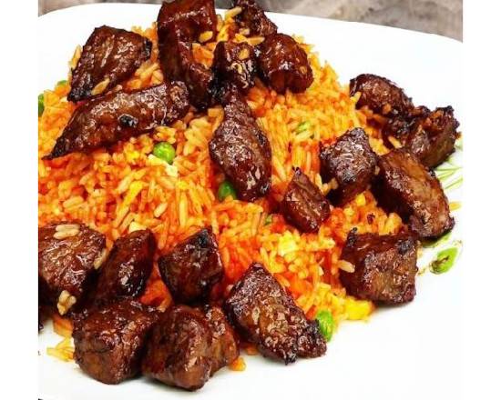 704. Fried Rice with tomato paste, mixed beans and Beef Steak Cubes