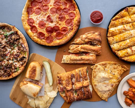 Simple Simon's Pizza - 1140 N Walton Blvd