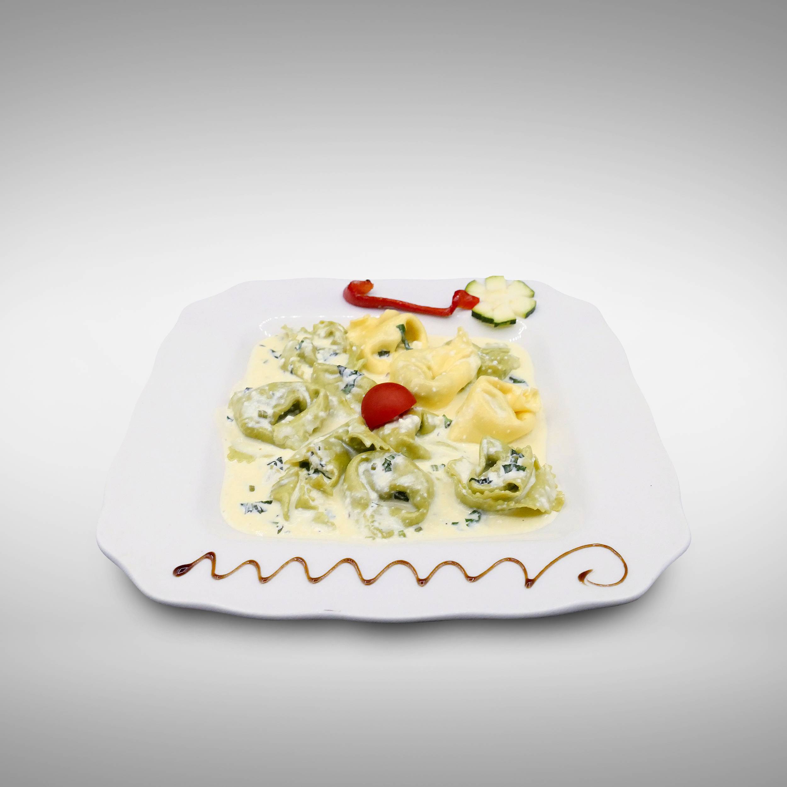 Pâtes ravioli à la ricotta et aux épinards
