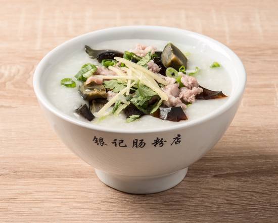 C9. Shredded Pork and Gold Preserved Egg Congee 皮蛋瘦肉粥 + Choice of Asian Snack