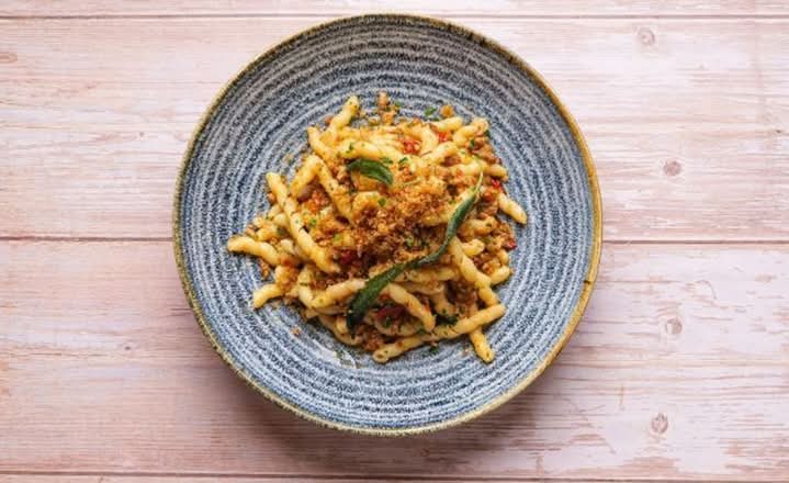 Tuscan sausage ragù busiate