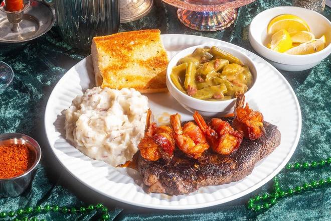 CAJUN RIBEYE WITH MARDI PARTY SHRIMP