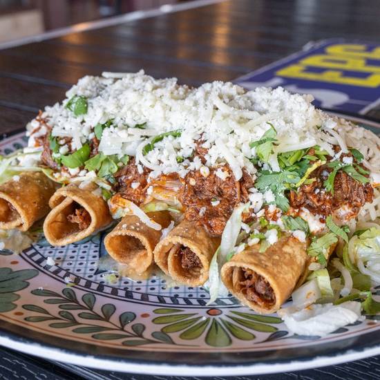 5 Rolled Tacos w/Birria on Top