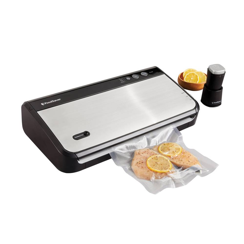 FoodSaver Système d’étanchéité sous vide avec accessoire de scellage portatif - Vacuum sealing system with handheld sealer attachment