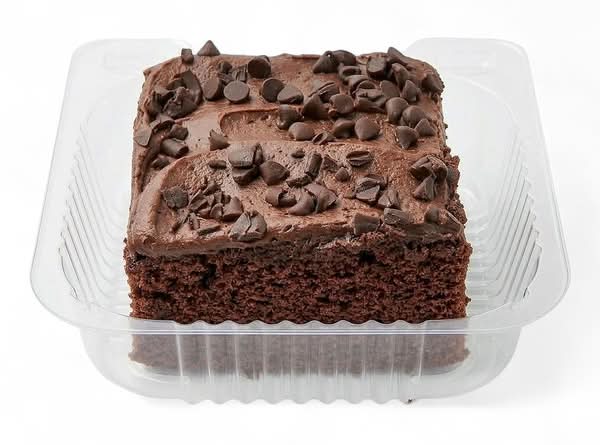 Chocolate Cake Square With Fudge Icing And Chocolate Curls