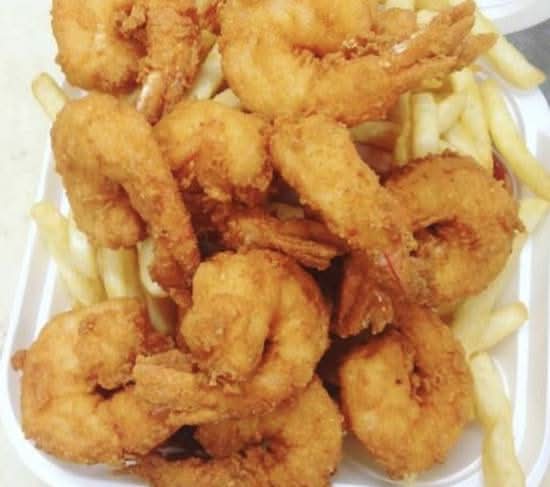 8 Pc Fried Shrimp with Fries or Cajun Rice
