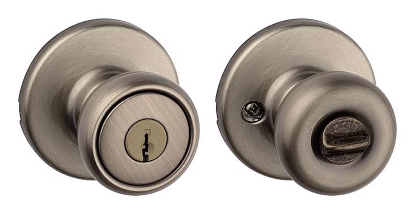 Kwikset Tylo Antique Brass Entry Door Knob 1-3/4 In.