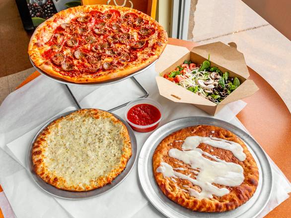 Family Pizza Package:choose up to 3 pizza toppings.  Comes with house salad & garlic cheese bread & cinnamon dessert pizza!