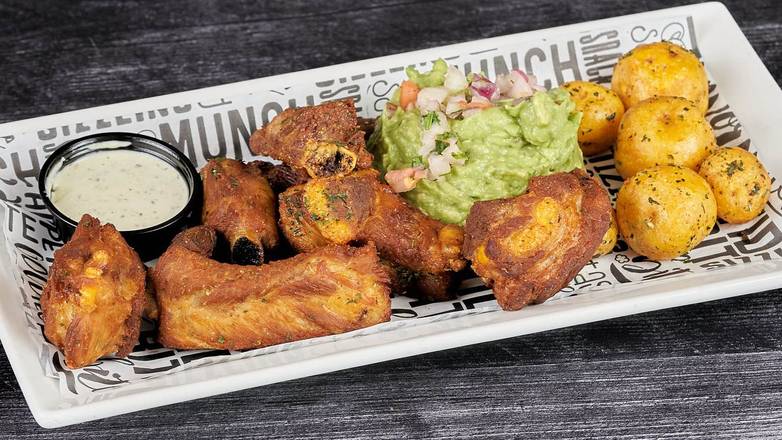 Fried pork ribs , guac & criolle potato