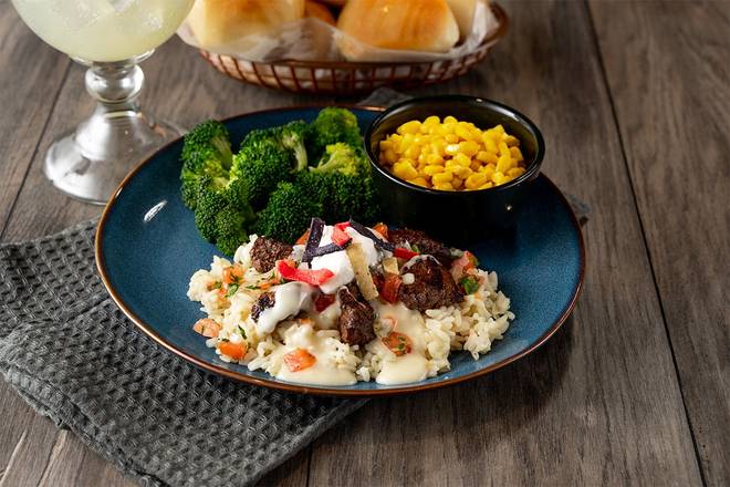 Order Queso Smothered Steak Tips food online from Logan's Roadhouse store, Spring Hill on bringmethat.com