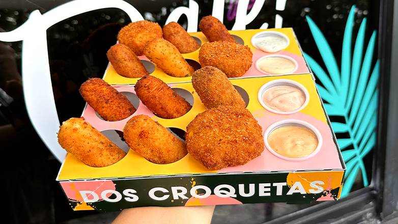 Order 12 | Croqueta Flight™ + Sauces food online from Dos Croquetas store, Medley on bringmethat.com