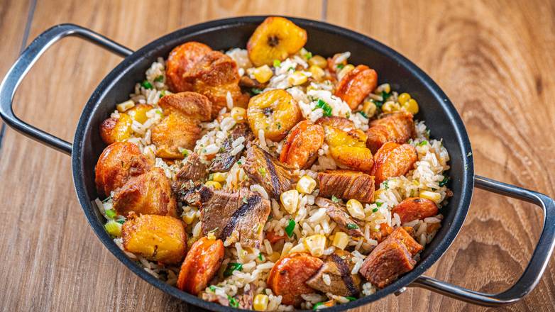 ARROZ PAISA (Mixed rice,skinpork chunks, sausage ,sweet plantain, corn ,and meat)