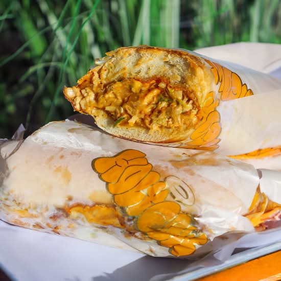 CHEESY CHICKEN CHOPPED CHEESE (HERO-SEEDED BUN)