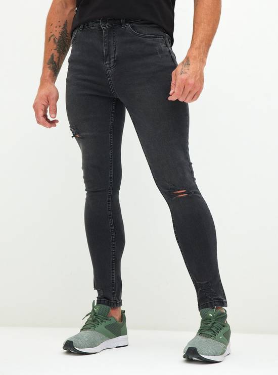 Jeans negro online rasgado