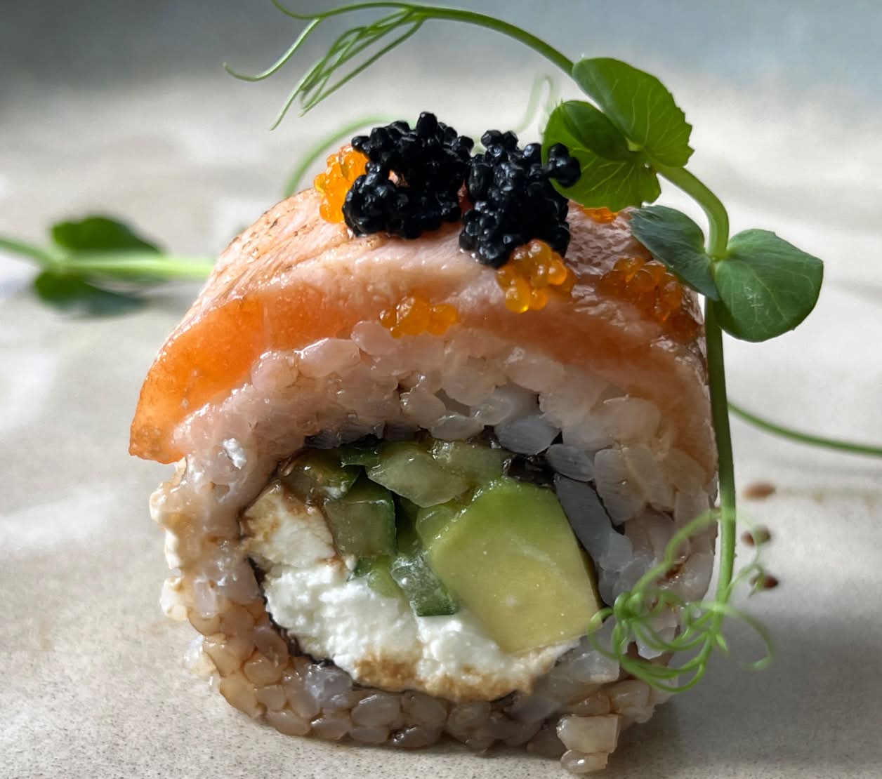 Roll with black caviar