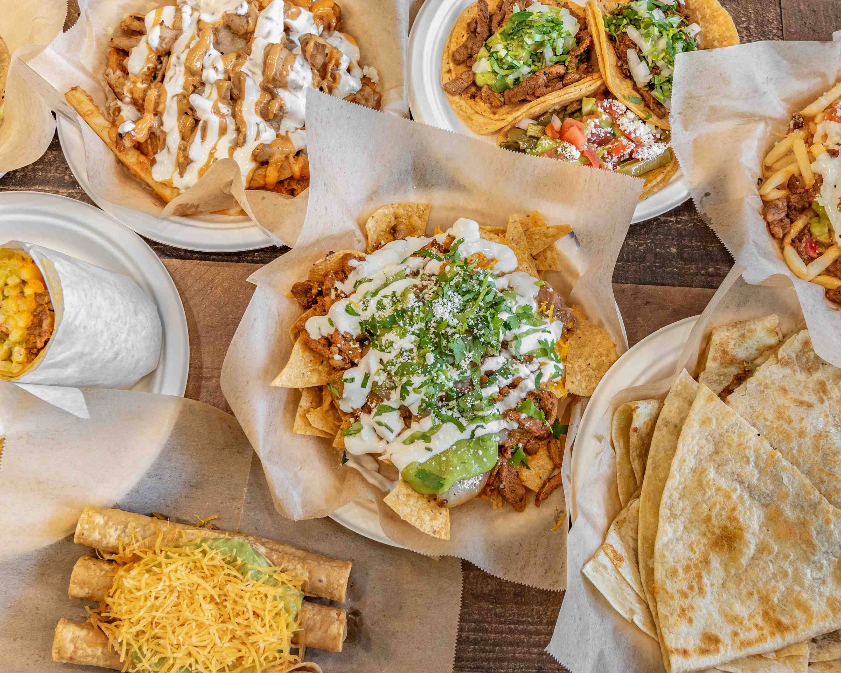 Order Chuy’s Taqueria y Burritos (Washington Ave) Menu Delivery in El