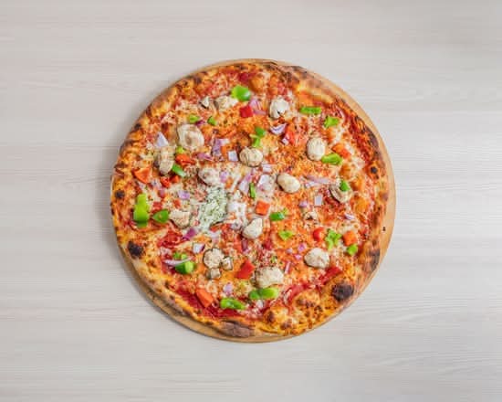 16 inch loaded halal veggie pizza topped with mushrooms, red and green peppers, and purple onions
