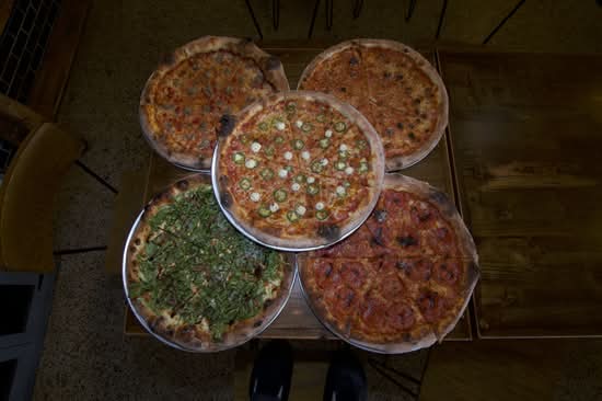 Raine's Pizzeria (2401 Curry Ford Rd)