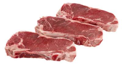 Beef Top Loin New York Strip Steak Bone In Service Case - 2 Lb