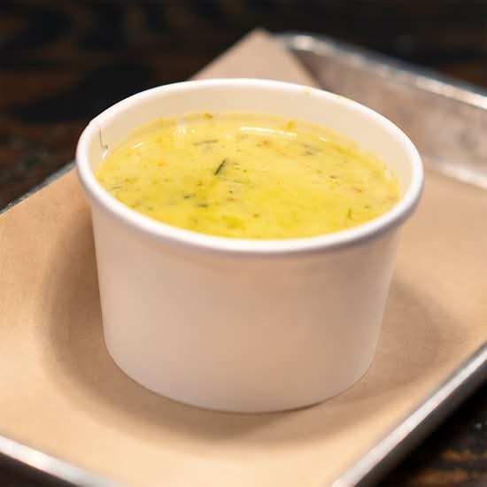 Cup of Green Chile Queso