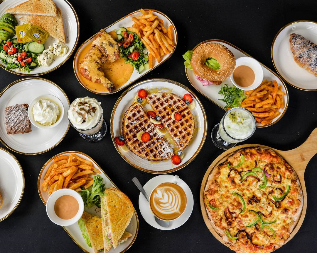 strictly Halaal café, Café Nazpresso interior, waffle sandwich with Oreo, espresso drink close-up, community café Joburg, friendly barista service, breakfast and brunch spot, coffee shop decor, wood-fired oven café, Joburg ETC