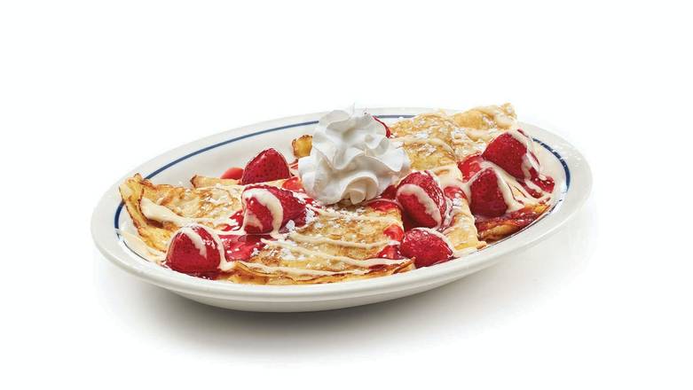 Order Strawberries & Cream Crepes food online from IHOP store, Miami on bringmethat.com