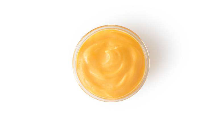 Cup of Cheddar Sauce