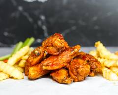 Wing Kings (6646 Collins Avenue)