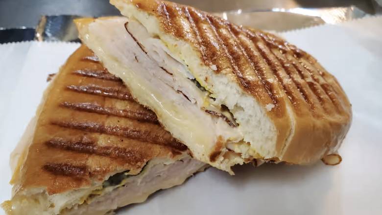 Order Troyer Turkey Breast & Cheese Panini food online from Lake Wales Cheese Shoppe & Deli store, Lake Wales on bringmethat.com
