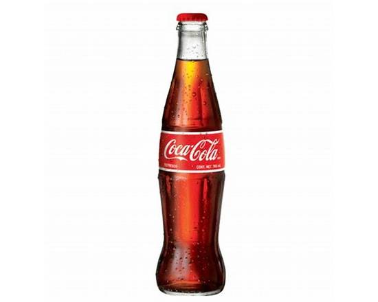 Order Mexican Coke food online from Ideal Market store, Baton Rouge on bringmethat.com