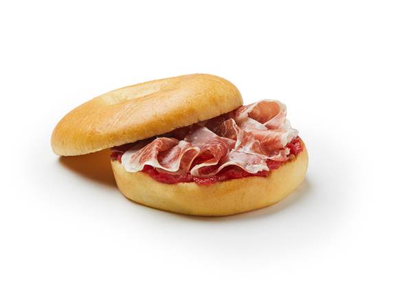 Bagel de cereales con jamón ibérico y tomate