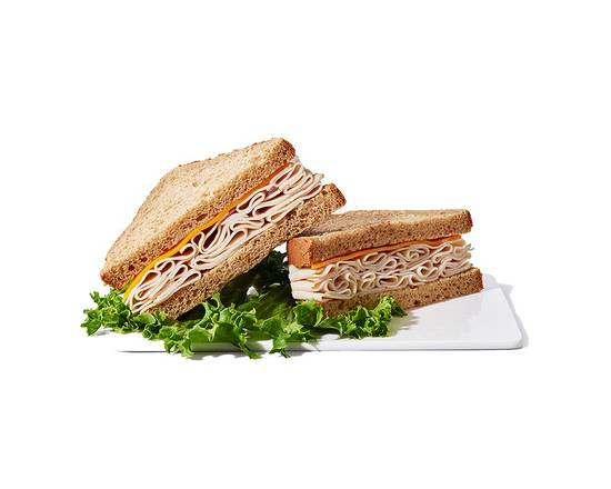 Order Turkey Cheddar on Wheat Sandwich food online from Chevron Extramile store, Everett on bringmethat.com