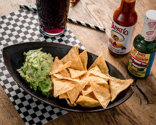 Tortilla chips and homemade guacamole