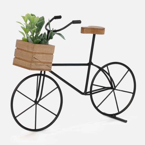 Petit vélo en métal avec plante décorative