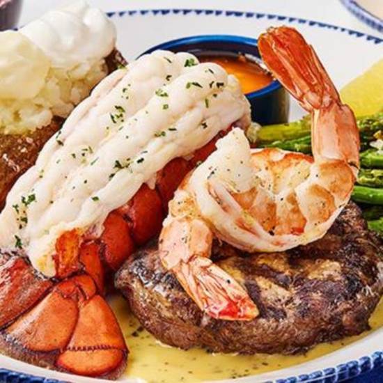 New! Signature Surf & Turf Maine Lobster Tail and 7 Oz. Sirloin**