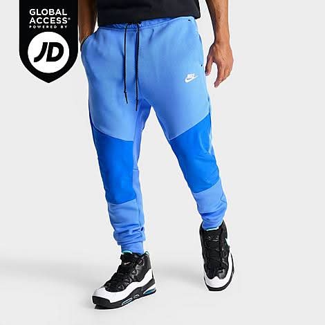 nike tech fleece joggers blue and black