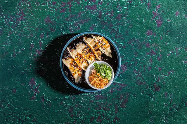 Steamed Chicken Dumplings in Fresh Herb Sauce
