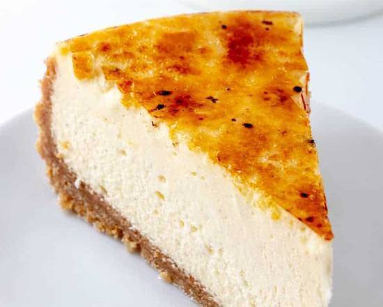 Creme Brulee Cheesecake Slice with Whip Cream