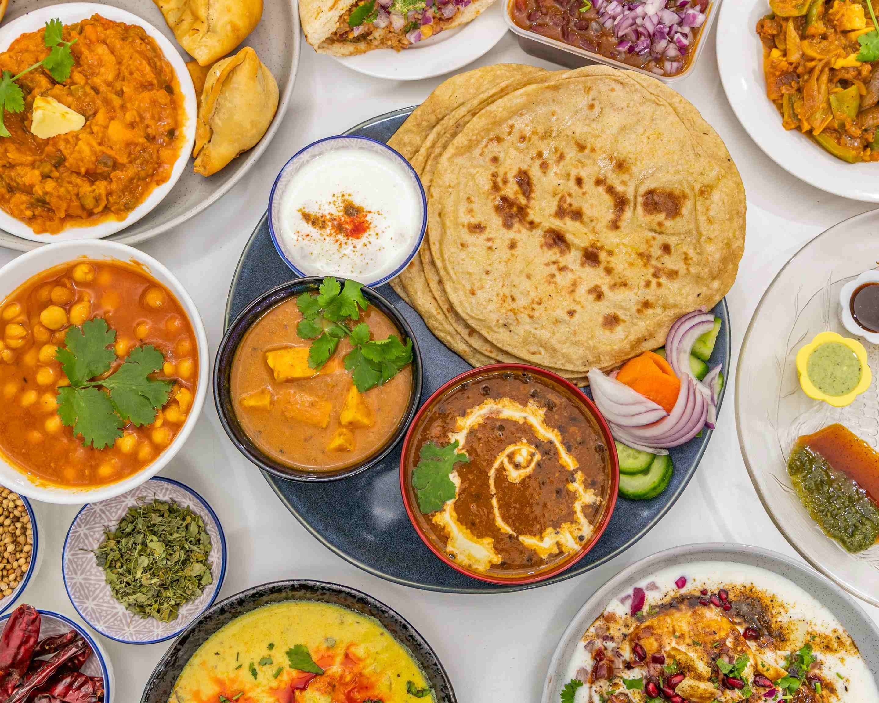 Indian Lunch Box Or Tiffin Spicy Ladies Finger Dal Fry Rice And Chapati  Stock Photo - Download Image Now - iStock