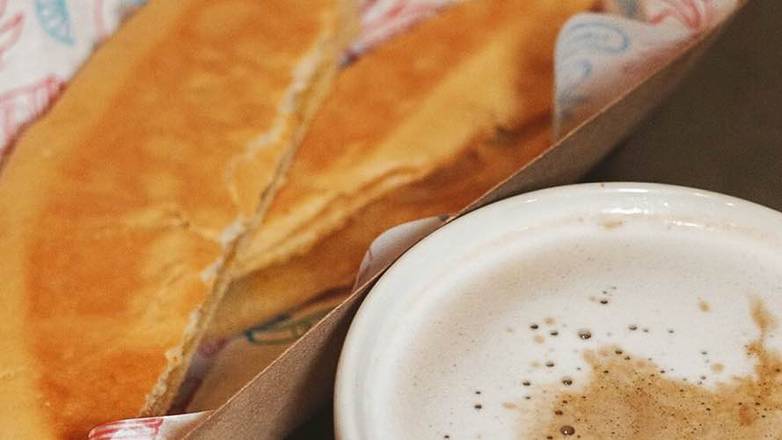 Order Buttery Tostada food online from Dos Croquetas store, Medley on bringmethat.com