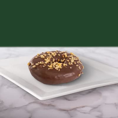 Dona de chocolate con topping de nuez