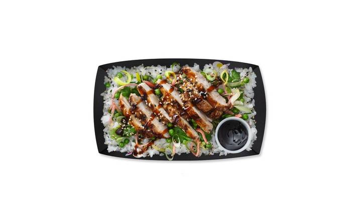 chicken teriyaki on a bed