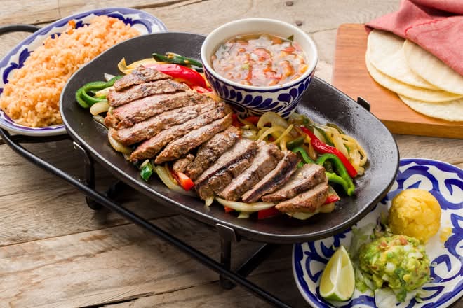 SIZZLING SKIRT STEAK FAJITAS