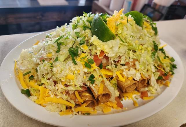 Ten Rolled Guacamole, Cheese, Lettuce, Pico Tacos