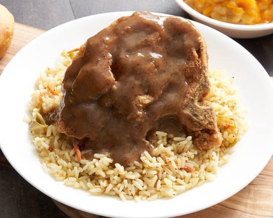 Smothered Pork Chop Steak with Brown Gravy Over Sassy Rice Dinner