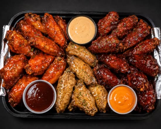 Roosters Wings! (2670 E College Ave)