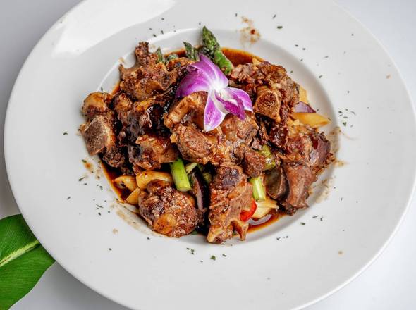 Order Oxtail Rasta Pasta food online from Taste Of The Caribbean store, Los Angeles on bringmethat.com
