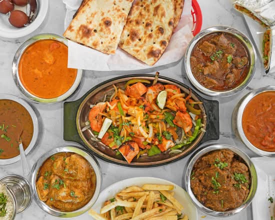TikKa Bowl N Wrapz  (10550 Twin Cities Rd, 20)