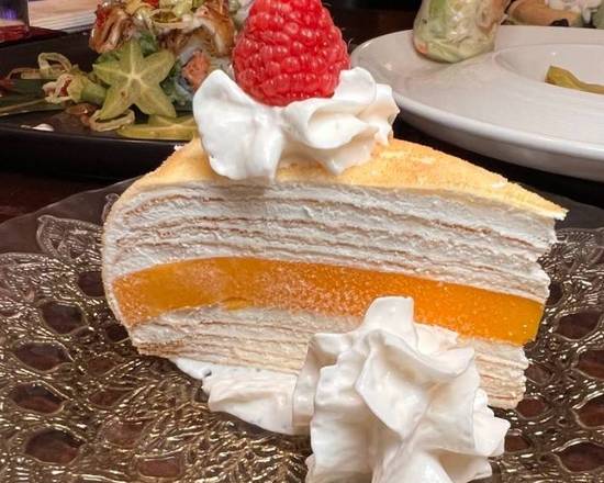 Order Mango Mille Crepe cake food online from Sushi Train store, Romeoville on bringmethat.com